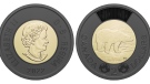 The two sides of a $2 coin with a black ring minted in honour of the late Queen Elizabeth II. (Royal Canadian Mint)