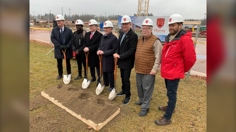 Dignitaries are seen at a ground-breaking ceremony for a new residence at Huron University College in London, Ont. on Dec. 7, 2022. (Bryan Bicknell/CTV News London) 