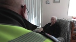 Primary care paramedic Mike Wright is pictured with patient Tony Bond. (CTV News)