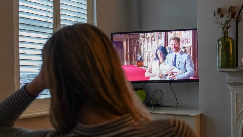 Watching the Duke and Duchess of Sussex's documentary on Netflix at a home in Warwick, Britain, on Dec. 8, 2022. (Jacob King / PA via AP) 