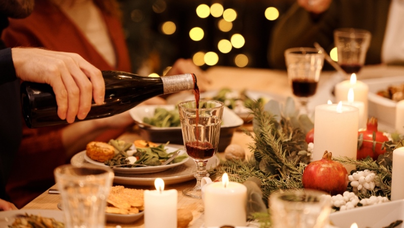 A stock photo showing people attending a holiday party. (pexels.com/nicole-michalou)
