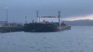 The barge is pictured at Ogden Point on Dec. 8, 2022. (CTV News)