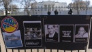Signs and pictures of those killed, including journalist Brent Renaud, are displayed on a fence during a protest against Russia's invasion of Ukraine in Lafayette Park near the White House, Sunday, March 13, 2022, in Washington. The International Federation of Journalists says 67 journalists and media staff have been killed around the world so far in 2022, up from 47 last year. (AP Photo/Alex Brandon, File)