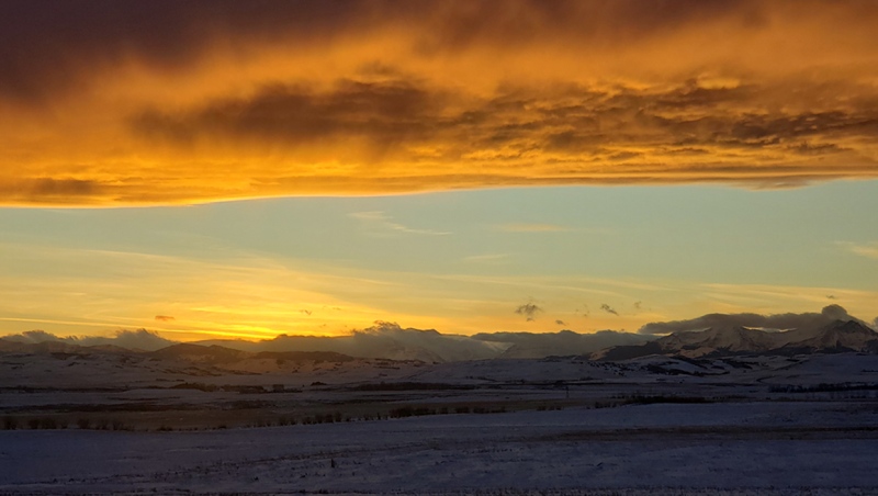 Thursday morning sunrise over the Rockies in southern Alberta. (courtesy viewer Alex)