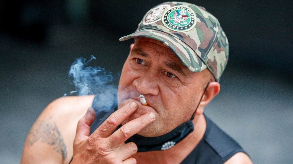 A man smoking in Auckland, New Zealand