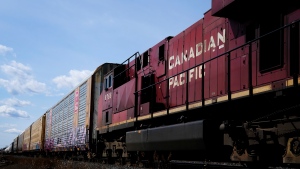 Canadian Pacific Railway trains sit idle on the train tracks at the main CP Rail trainyard in Toronto on Monday, March 21, 2022. THE CANADIAN PRESS/Nathan Denette