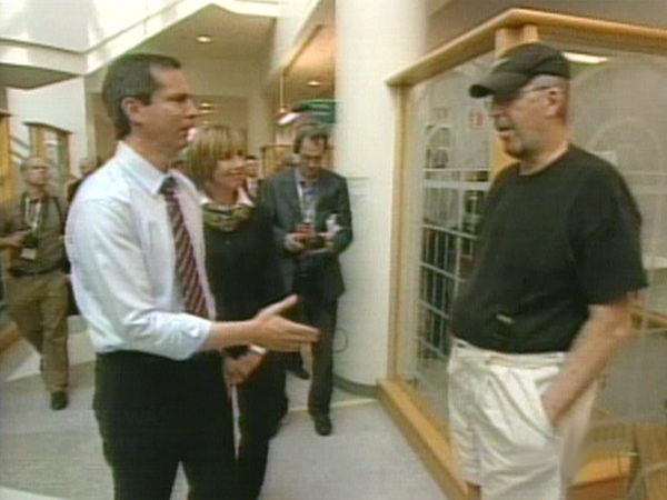 Mike Brady, upset with the province for not paying for certain cancer drugs, refused to shake McGuinty's outstretched hand.