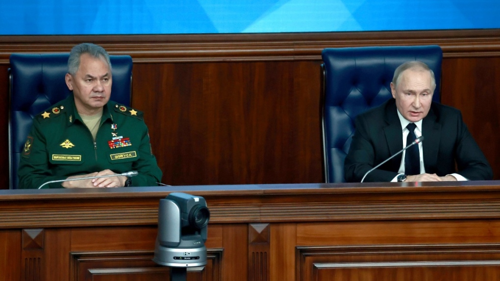 Vladimir Putin, right, and Sergei Shoigu