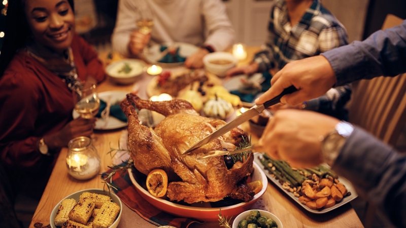 Don't blame the turkey for your post-meal sleepiness, experts say. (Adobe Stock)