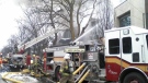 Firefighters respond to a three-alarm blaze at an apartment complex on Glebe Avenue, Monday, Jan. 18, 2010.