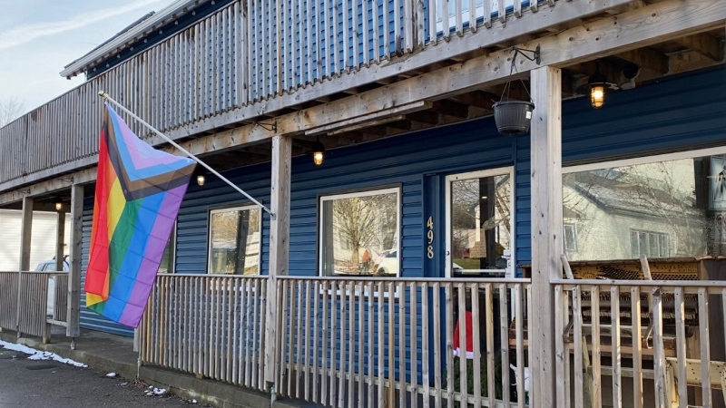 A pride flag flies outside the Bees Knees General Store and Bakery in Lawrencetown, N.S., on Dec. 30, 2022. (Hafsa Arif/CTV) 