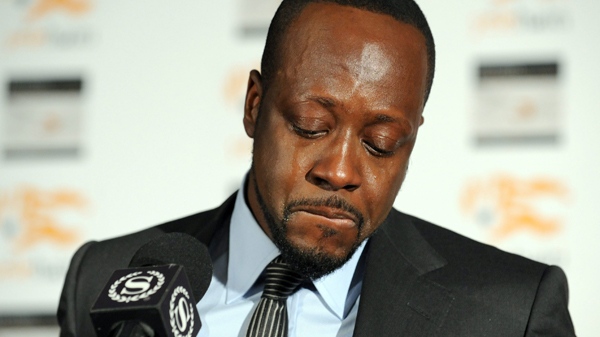 Haitian-born musician Wyclef Jean is overcome with emotion while discussing his recent visit to earthquake-stricken Haiti and how is organization, Yele Haiti, is helping with relief efforts, Monday, Jan. 18, 2010, in New York. (AP / Diane Bondareff)