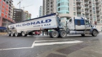 A transport truck turns at the intersection of Rideau and Waller streets in downtown Ottawa. Jan. 10, 2023. (Dave Charbonneau/CTV News Ottawa)