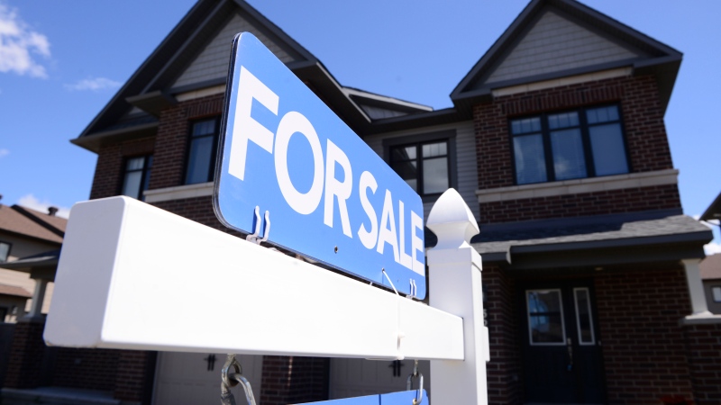 A new home is displayed for sale in a new housing development in Ottawa on Tuesday, July 14, 2020. Prospective buyers have lamented the torrid pace Canada's real estate market has moved at in recent years, but many feel 2023 may be the year their luck changes. THE CANADIAN PRESS/Sean Kilpatrick