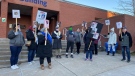 Protesters gather outside Halifax Regional Police headquarters on Jan. 11, 2023, to bring bring attention to the disappearance of Devon Sinclair Marsman almost a year after he was reported missing. (Stephanie Tsicos/CTV Atlantic)