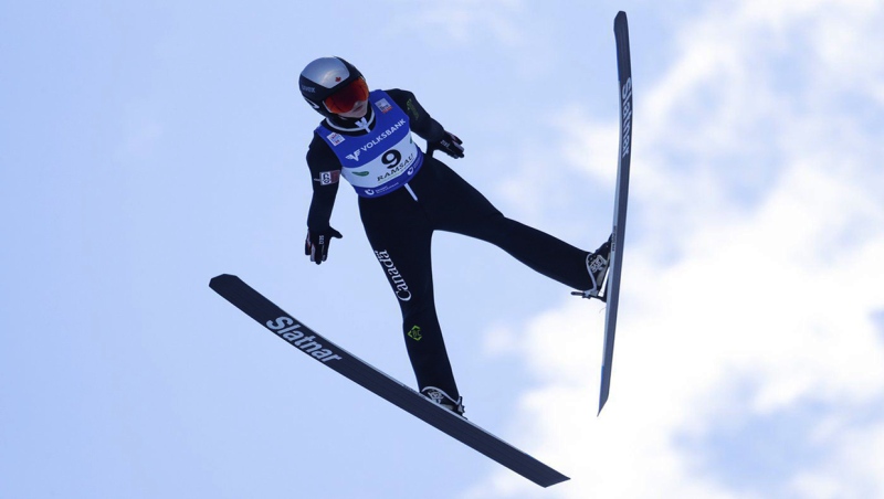 Alexandria Loutitt of Calgary soars through the air during the FIS Ski Jumping Women's World Cup in Ramsau, Austria, on Friday, Dec. 17, 2021. Loutitt became the first Canadian to win World Cup women's ski jump gold in mid-January in Zao, Japan after jumps of 98.5 and 95 metres. She won another gold at an event in Whistler Thursday. THE CANADIAN PRESS/AP -Lisa Leutner
