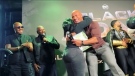 Author Kelsey Snow meeting Dwayne 'The Rock' Johnson and giving him a copy of her children's book. (Submitted: Collins Agahzadeh)