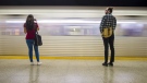 Commuters wait to take the subway at Ossington Station in Toronto on June 22, 2018. (THE CANADIAN PRESS/ Tijana Martin)