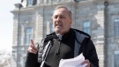 FTQ president Daniel Boyer speaks to union workers, Wednesday, April 28, 2021 at the legislature in Quebec City. Union members paid a tribute on the national day of recognition for workers who died or were wounded at work.THE CANADIAN PRESS/Jacques Boissinot