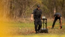 Members of the Six Nations Police conduct a search for unmarked graves using ground-penetrating radar on the 500 acres of the lands associated with the former Indian Residential School, the Mohawk Institute, in Brantford, Ont., Tuesday, November 9, 2021. (THE CANADIAN PRESS/Nick Iwanyshyn)