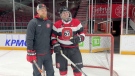 Andriy Maslov (right) with Evan Brownrigg, Ottawa 67’s Player Development Coach. Maslov, 44, has never played hockey before. The Ukrainian refugee got a chance to play with the Ottawa 67's Jan. 16, 2023. (Dave Charbonneau/CTV News Ottawa)