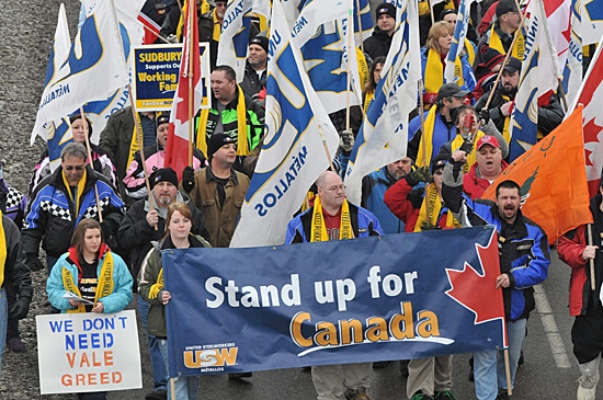 Striking members of the United Steelworkers local 6500 and supporters march in Sudbury,Ontario on Wednesday, Jan. 13, 2010, to mark the sixth month of their strike against Vale Inco.(THE CANADIAN PRESS/Gino Donato)