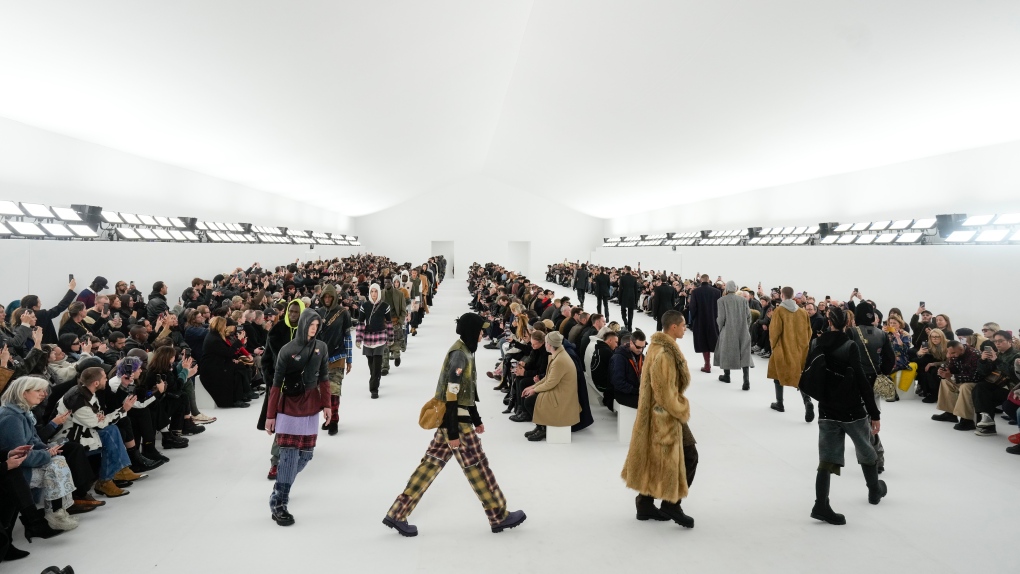 Celine closes Paris Fashion Week with bare-chested models and