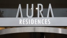The sign on the Aura condominium building is shown in Toronto on Tuesday, Jan. 17, 2023. A unit in the building was recently sold without the owner's knowledge. THE CANADIAN PRESS/Frank Gunn