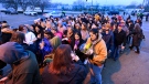Fans line up to enter Graceland for a memorial service for Lisa Marie Presley Sunday, Jan. 22, 2023, in Memphis, Tenn. (AP Photo/John Amis)