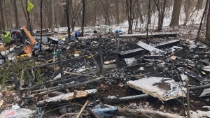 The aftermath of a fire at an encampment near Franklin Blvd. and Champlain Blvd. on Jan. 24, 2023. (CTV News/Chris Thompson)