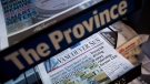 Copies of Postmedia-owned newspapers the Vancouver Sun and The Province are displayed at a store in Burnaby, B.C., on Tuesday, Jan. 19, 2016. THE CANADIAN PRESS/Darryl Dyck