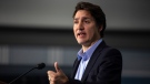 Prime Minister Justin Trudeau speaks to the media at the McMaster Automotive Resource Centre, in Hamilton, Ont., during the final day of meetings at the Liberal Cabinet retreat, on Wednesday, January 25, 2023. THE CANADIAN PRESS/Nick Iwanyshyn