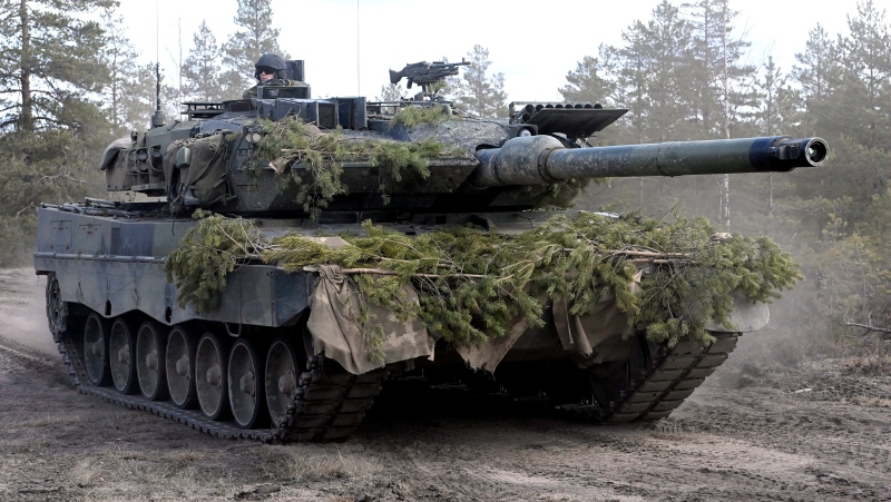 A Leopard battle tank of the Armoured Brigade is seen during the Army mechanised exercise Arrow 22 exercise at the Niinisalo garrison in Kankaanp'', Western Finland, on May 4, 2022. Finland appears on the cusp of joining NATO. Sweden could follow suit. By year's end, they could stand among the alliance's ranks. Russia's war in Ukraine has provoked a public about face on membership in the two Nordic countries. They are already NATO's closest partners, but should Russia respond to their membership moves they might soon need the organization's military support. (Heikki Saukkomaa/Lehtikuva via AP) 
