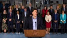 Prime Minister Justin Trudeau, joined by members of the Liberal Cabinet, speaks to the media at the McMaster Automotive Resource Centre, in Hamilton, Ont., during the final day of meetings at the Liberal Cabinet retreat, on Wednesday, January 25, 2023. THE CANADIAN PRESS/Nick Iwanyshyn