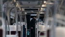 A Police officer stands inside a TTC streetcar on Spadina Ave., in Toronto on Tuesday, January 24, 2023. Police say a person was stabbed multiple times on a Toronto streetcar. They say the victim was sent to hospital and a suspect was arrested at the scene. THE CANADIAN PRESS/Arlyn McAdorey