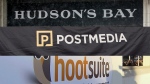 The logos of the Hudson's Bay Company, Postmedia and Hootsuite are seen in this composite photo. (CP Photo)
