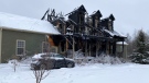 The charred remains of a home in Moncton, N.B., is pictured on Jan. 26, 2023. (Derek Haggett/CTV)