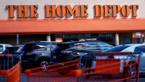 Shopping carts are parked outside a Home Depot in Philadelphia, Wednesday, Sept. 21, 2022. (AP Photo/Matt Rourke) 
