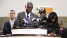 Civil rights attorney Ben Crump speaks at a news conference with the family of Tyre Nichols, who died after being beaten by Memphis police officers, as RowVaughn Wells, mother of Tyre, right, and Tyre's stepfather Rodney Wells, along with attorney Tony Romanucci, left, also stand with Crump, in Memphis, Tenn., Jan. 23, 2023. (AP Photo/Gerald Herbert)