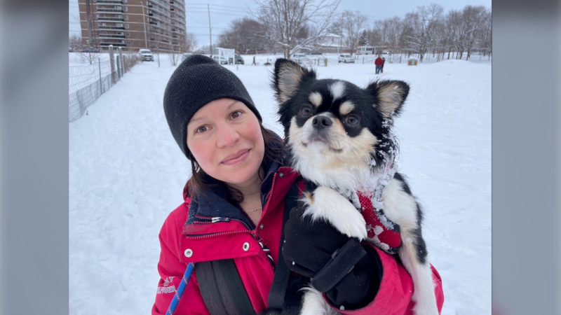 Pamela and her small dog are seen at the Commissioners Road East dog park in London, Ont. on Thursday, Jan. 26, 2023. (Sean Irvine/CTV News London) 