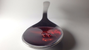 A spoonful of cough syrup is shown in Toronto, Saturday, Jan.25, 2014. (THE CANADIAN PRESS/Graeme Roy)