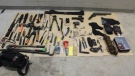 According to RCMP, the man they arrested had a sawed-off riding shotgun, along with multiple knives, a baton, plastic brass knuckles and break-in tools on his person, and face coverings, gloves and more break-in tools in the car.