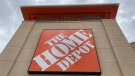 A Home Depot logo sign hands on its facade, Friday, May 14, 2021, in North Miami, Fla. Home Depot's sales rose in its fiscal second quarter, buoyed by continued demand for items related to home improvement projects. (AP Photo/Wilfredo Lee, File)