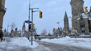 Police at the barricades at Wellington and Elgin streets on Friday, Jan. 27, 2023. (Josh Pringle/CTV News Ottawa)