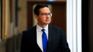 Conservative leader Pierre Poilievre makes his way to hold a press conference in the foyer of the House of Commons on Parliament Hill in Ottawa on Wednesday, Jan. 25, 2023. THE CANADIAN PRESS/Sean Kilpatrick 