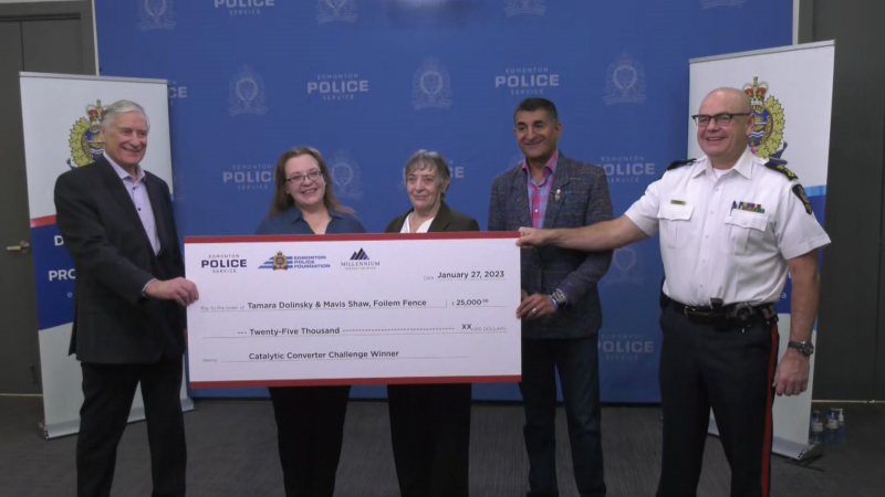 From left to right: Millennium Insurance Corporation CEO Aaron Perdue, Tamara Dolinsky, her mother Mavis Shaw, Edmonton Police Foundation chair Ashif Mawji, and Edmonton Police Service chief Dale McFee pose for a picture on Jan. 27, 2023, with a $25,000 cheque. Shaw and Dolinsky won the money for their "Foilemfence" product through the police foundation's Community Solutions Accelerator program, which Millennium donated to. 