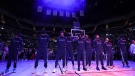 Memphis Grizzlies stand for a moment of silence for Tyre Nichols before the game against the Minnesota Timberwolves on Friday. (Matt Krohn/USA Today Sports/Reuters/CNN)