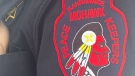 An embroidered patch is shown on a Kahnawake peacekeeper's uniform. (CTV News/Daniel Rowe)