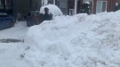 Several snowbanks surround the Vanier neighbourhood. Some streets reduced to a single lane because of the heaps of snow. (Jackie Perez/CTV News Ottawa)