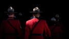 RCMP officers in Red Serge parade into a change of command ceremony for incoming B.C. RCMP Commanding Officer, Deputy Commissioner Dwayne McDonald, in Langley, B.C., on Tuesday, September 20, 2022. (THE CANADIAN PRESS/Darryl Dyck)